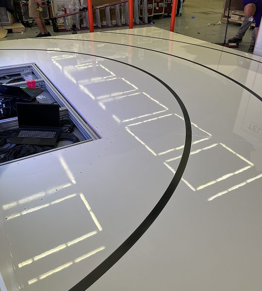LED wall being installed into the portal frame
