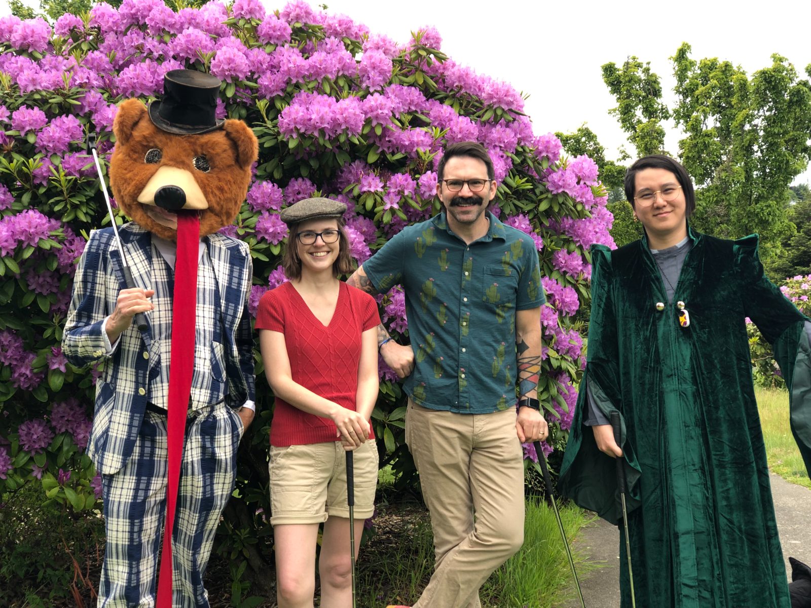 Studio team in costume at the annual mini-golf tournament