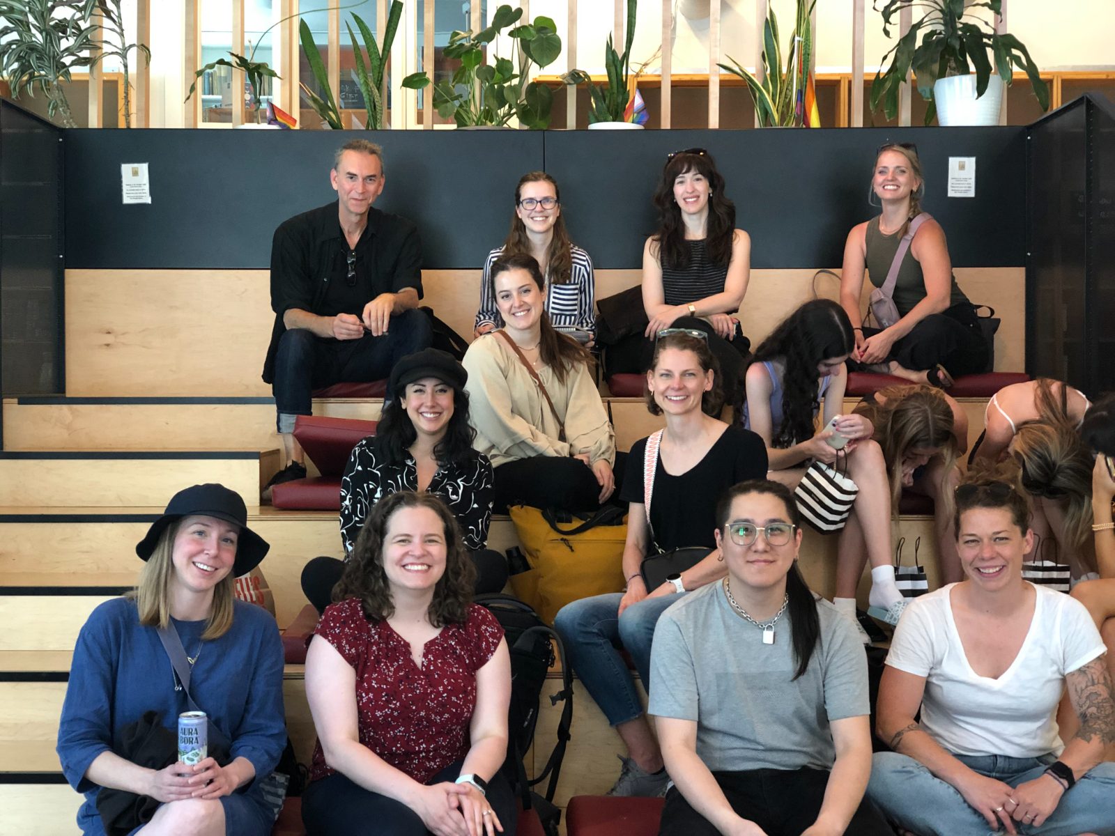 The studio gathered on the stairs at a regional retreat