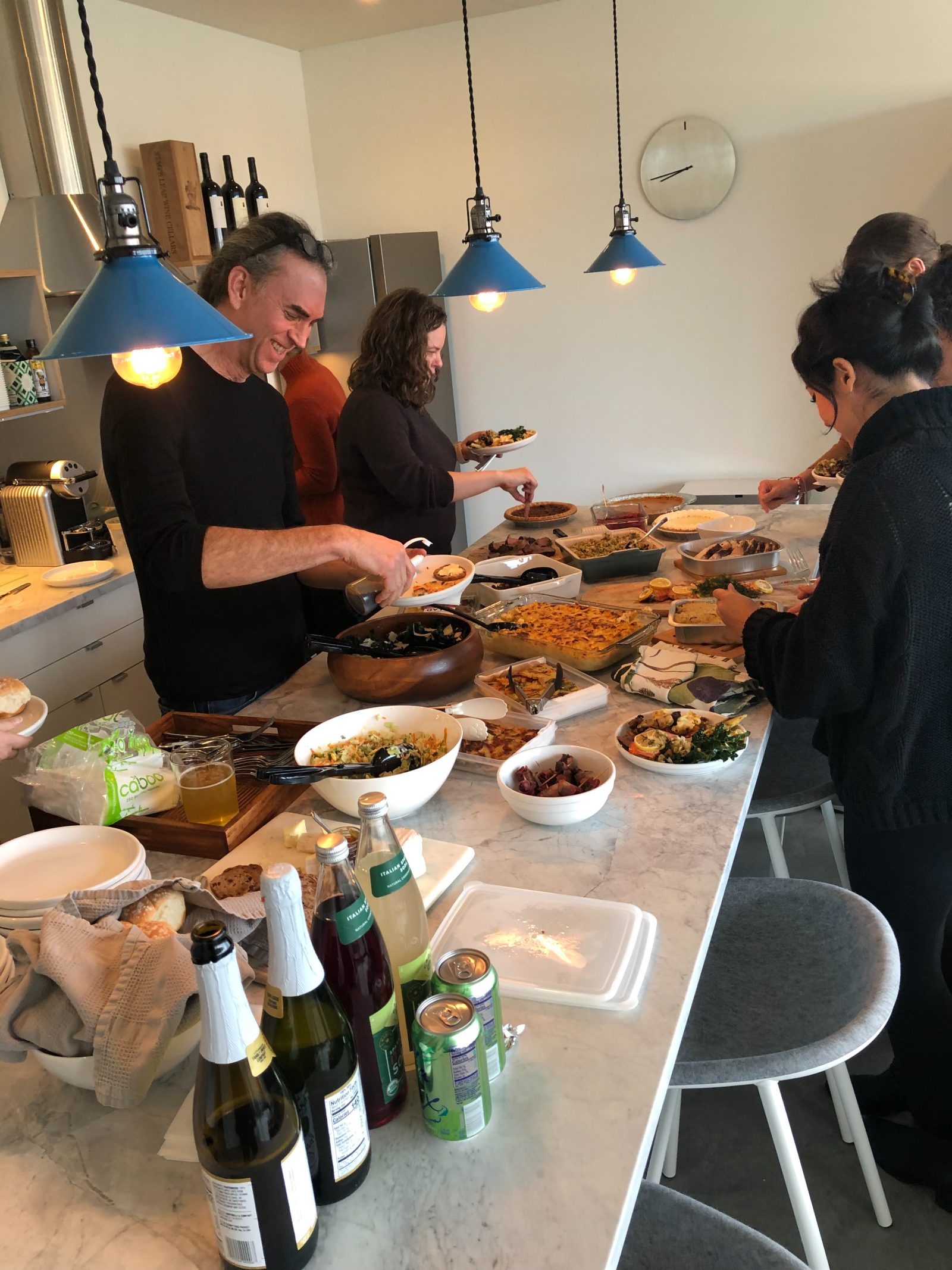 The studio potluck table during Home Week