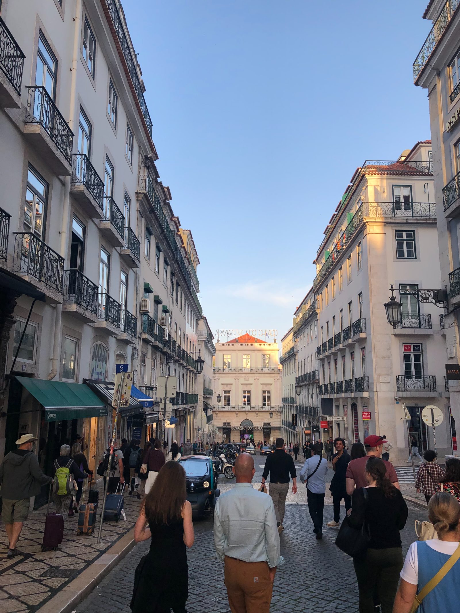 A city street at dusk on a studio work trip
